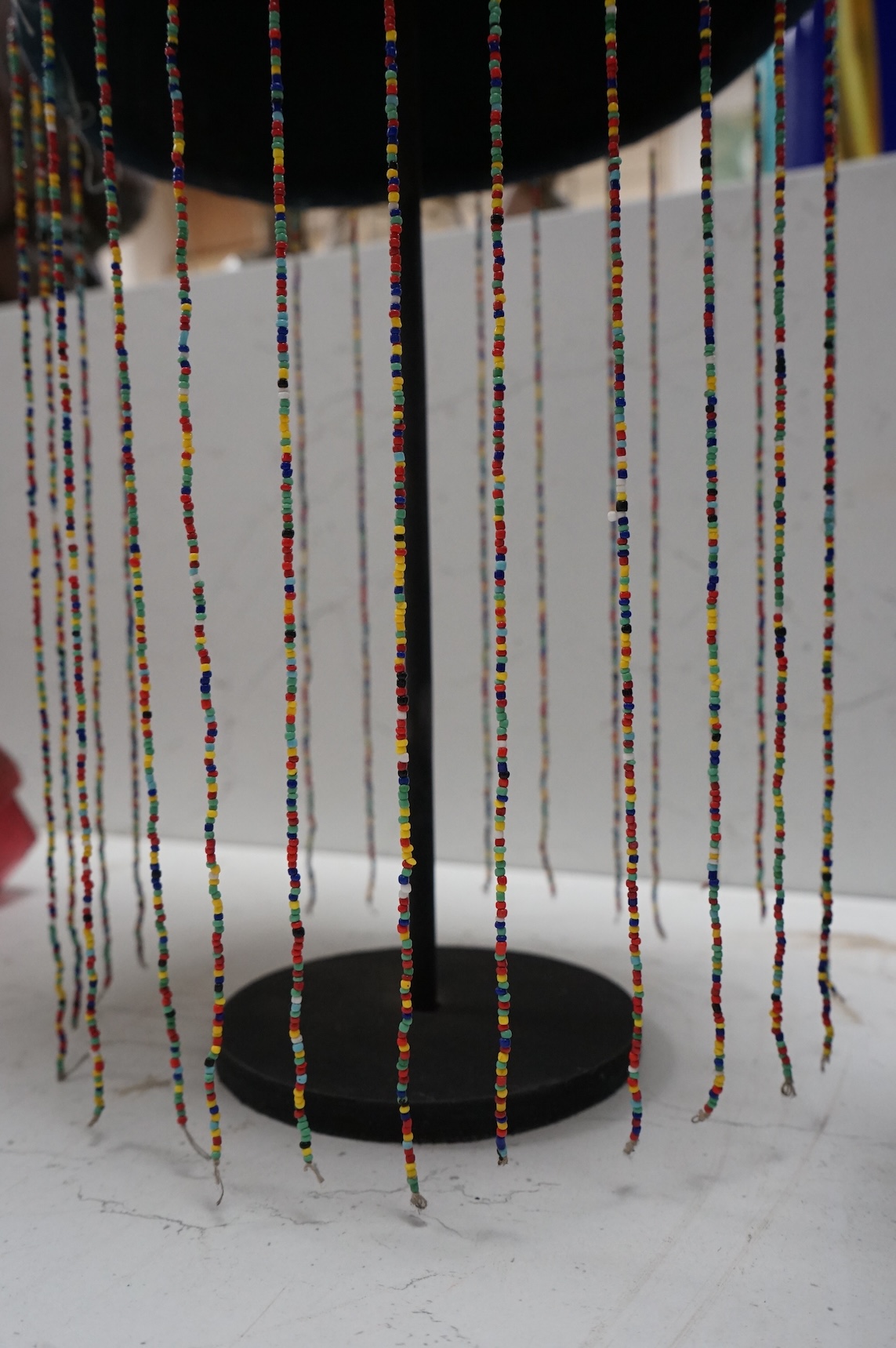 Tribal interest - West African Yoruba beaded crown on stand, 78cm high